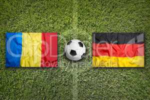 Romania vs. Germany flags on soccer field