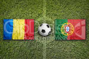 Romania vs. Portugal flags on soccer field