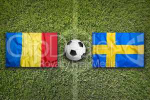 Romania vs. Sweden flags on soccer field