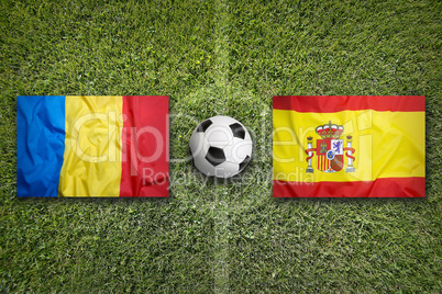 Romania vs. Spain flags on soccer field