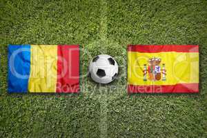 Romania vs. Spain flags on soccer field