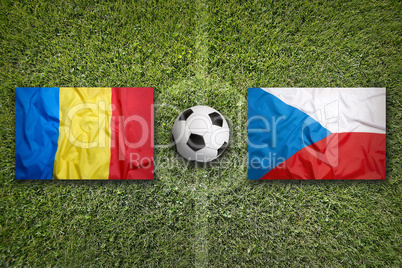 Romania vs. Czech Republic flags on soccer field