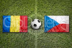 Romania vs. Czech Republic flags on soccer field
