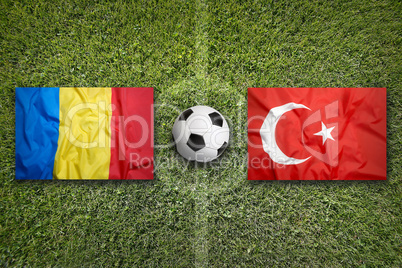 Romania vs. Turkey flags on soccer field