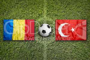 Romania vs. Turkey flags on soccer field