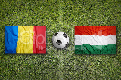 Romania vs. Hungary flags on soccer field