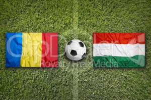 Romania vs. Hungary flags on soccer field