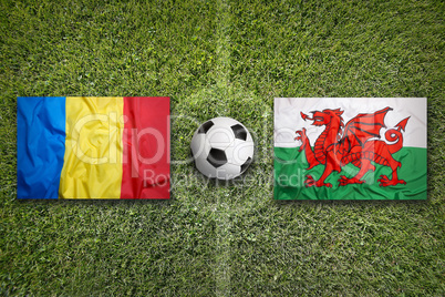 Romania vs. Wales flags on soccer field