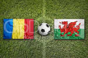 Romania vs. Wales flags on soccer field