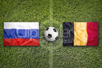 Russia vs. Belgium flags on soccer field