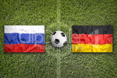 Russia vs. Germany flags on soccer field