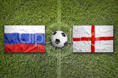 Russia vs. England flags on soccer field