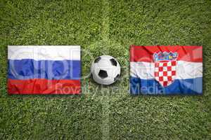 Russia vs. Croatia flags on soccer field
