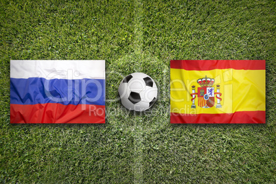 Russia vs. Spain flags on soccer field