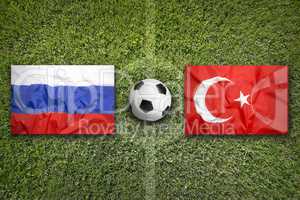Russia vs. Turkey flags on soccer field