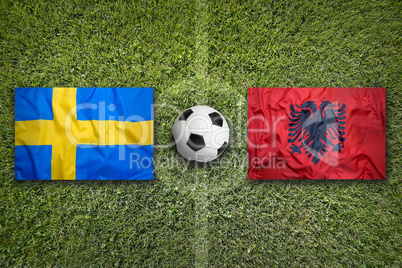 Sweden vs. Albania flags on soccer field