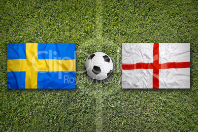 Sweden vs. England flags on soccer field