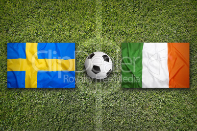 Sweden vs. Ireland flags on soccer field
