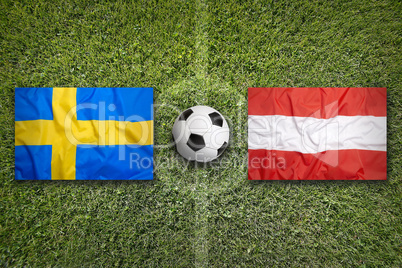 Sweden vs. Austria flags on soccer field