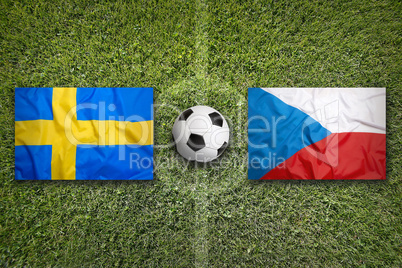 Sweden vs. Czech Republic flags on soccer field