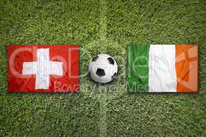 Switzerland vs. Ireland flags on soccer field