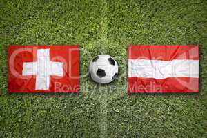 Switzerland vs. Austria flags on soccer field