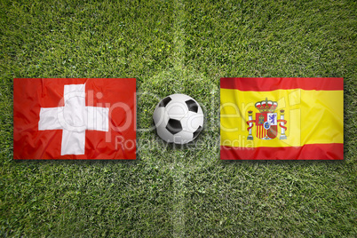 Switzerland vs. Spain flags on soccer field