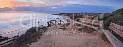 Bench along an outlook with a view of Crystal Cove Beach