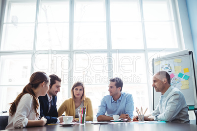 Business people discussing in meeting room