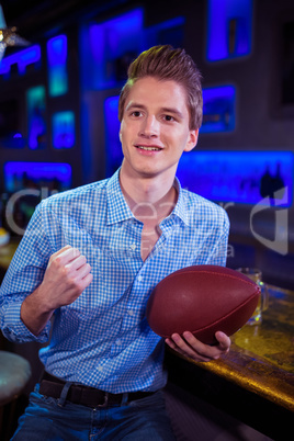 Young man with rugby ball