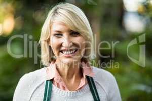 Portrait of smiling female gardener