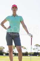 Low angle view of golfer woman