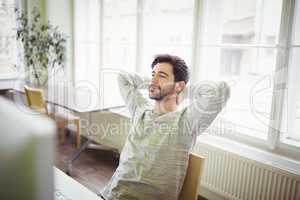 Businessman relaxing in creative office