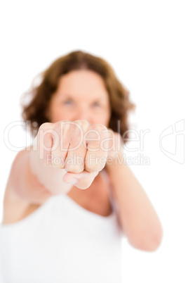 Portrait of woman punching