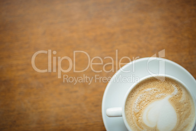 Overhead view of fresh coffee served on table