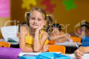 Cute girl in classroom