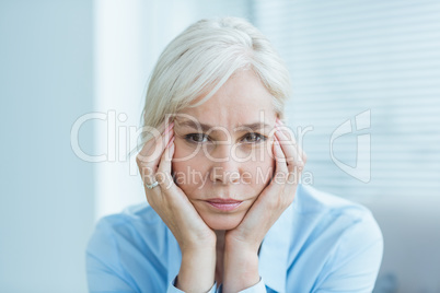 Portrait of sad senior woman