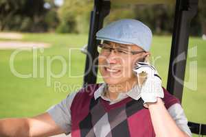 Golfer smiling and calling