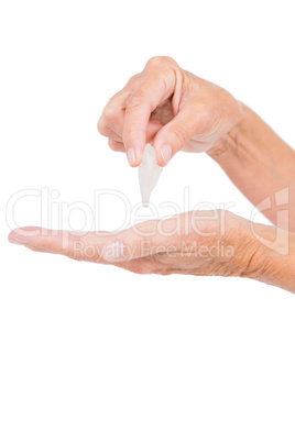 Cropped image of person holding pebble