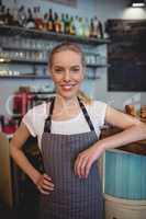 Portrait of confident female worker at coffee house