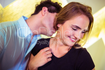 Couple embracing in nightclub