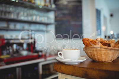 Close-up of fresh coffee and breads at cafe