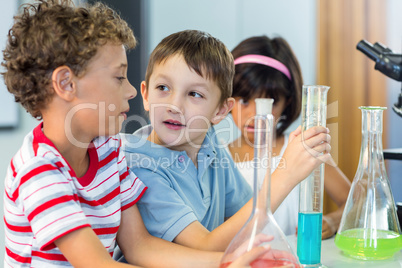 Schoolboy looking at classmate