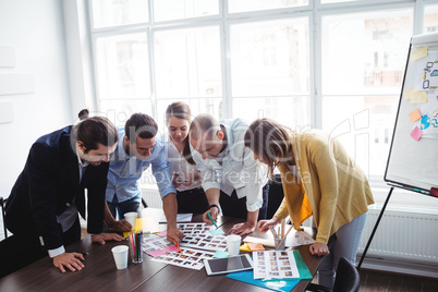 Photo editors discussing about photos