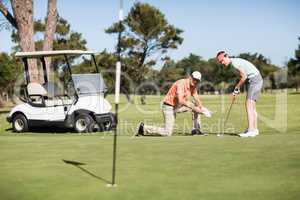 Couple playing golf together