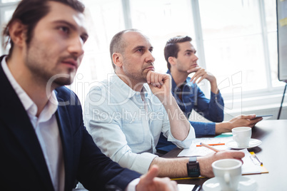 Thoughtful business people during meeting