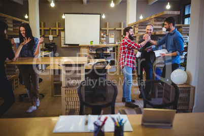 Business people during coffee break in office