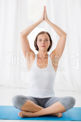 Full length of woman performing yoga