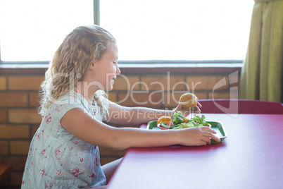 Girl having meal