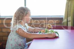 Girl having meal